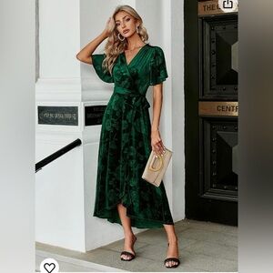 Emerald green velvet wrap dress.